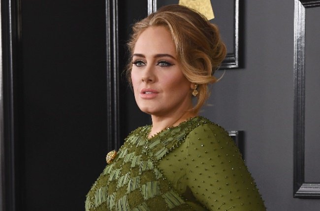 Fans accuse Adele of cultural appropriation after Jamaican flag bikini and Bantu knots pic