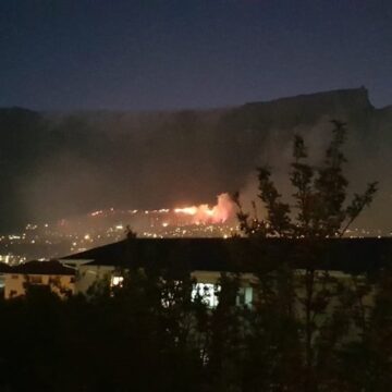 Table Mountain fire: Firefighters battle raging blaze fanned by strong wind