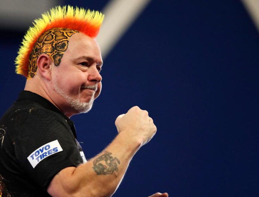 Wright schakelt revelatie Rydz na zenuwslopende partij uit op WK darts